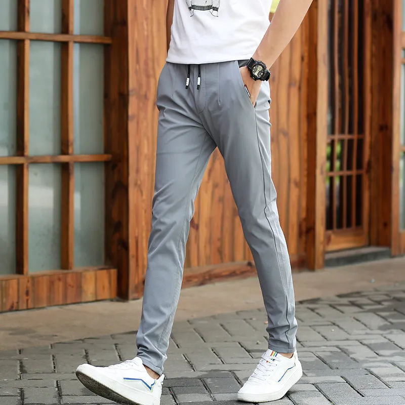 Men's casual pants in autumn and winter, men's body, elastic trousers, tightness, tight fitting trousers and thick men's pants